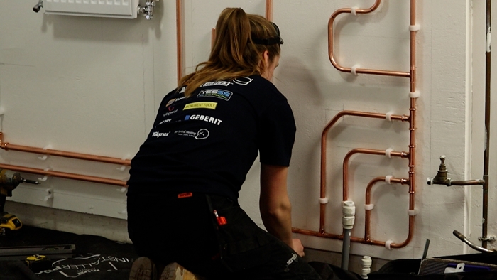 Signpost of Women Given Chance to Win Plumbing Career Kick-Start